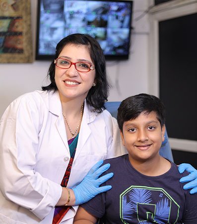 Pediatric Eye Doctor Malvika Gupta with Happy Patient